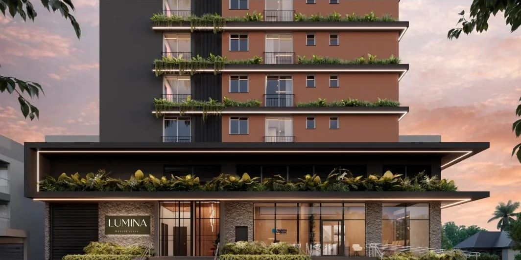 Entrada do Residencial Lumina ao anoitecer